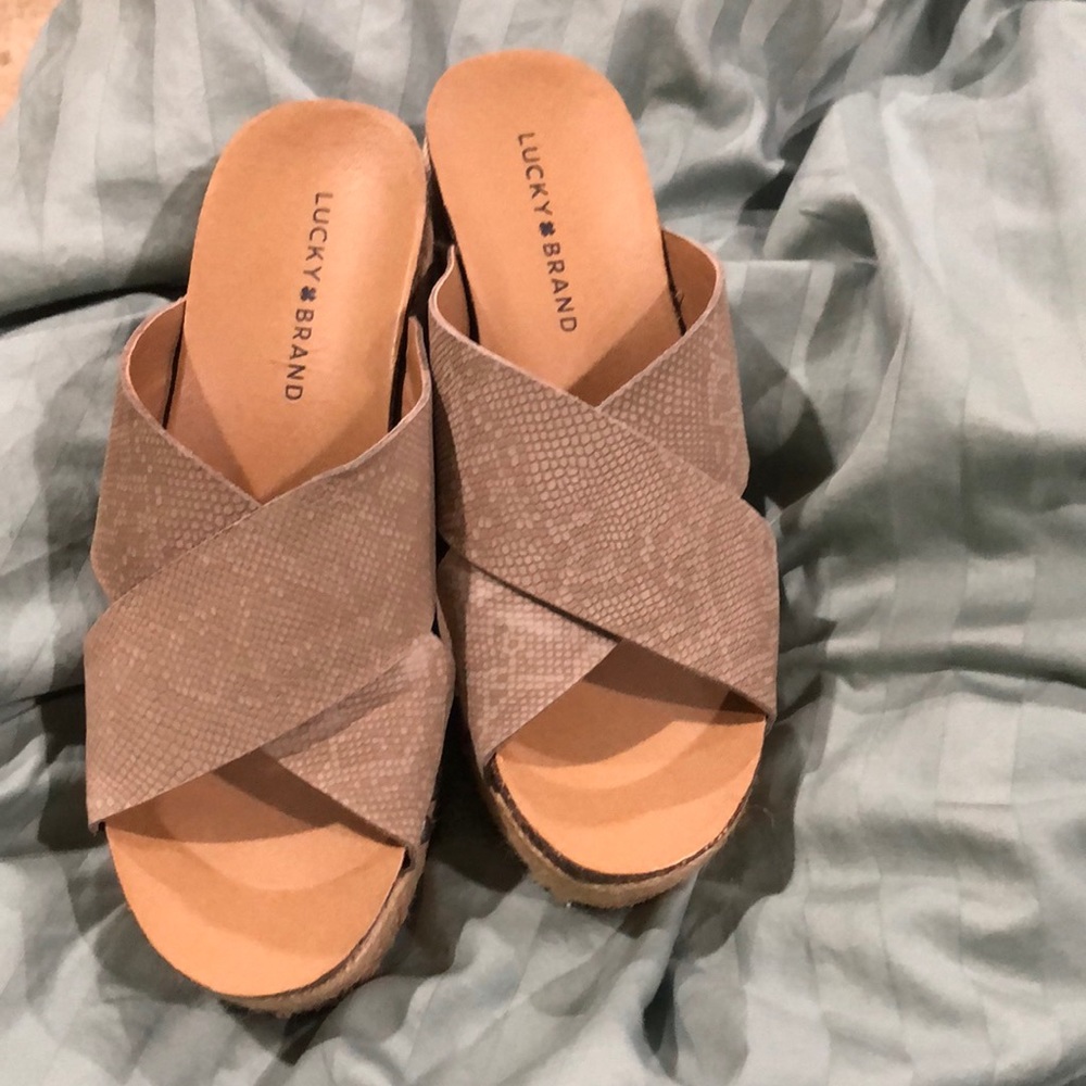 New Size 10 lucky brand 3-4” wedges, leather upper with snake skin design.
